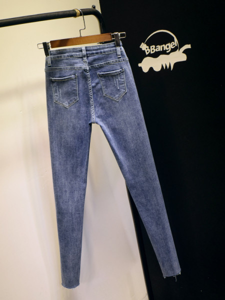 Kõrge vöökoha ja rebenenud motiividega vabaaja naiste teksad - Slim mudel