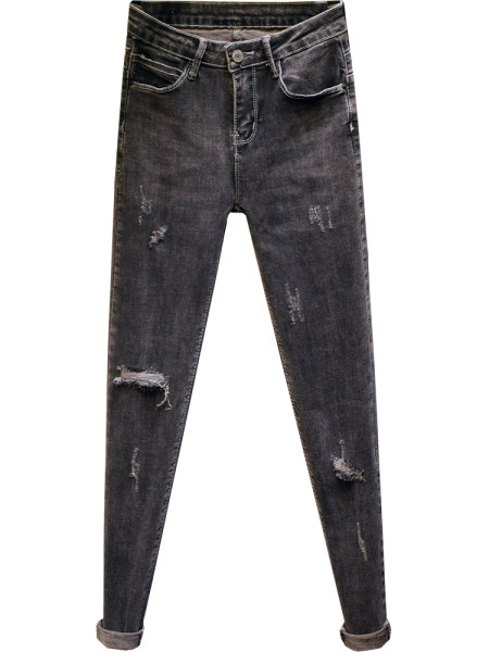 Novi model pripijenih ženskih traperica u sivoj boji sa poderanim motivima