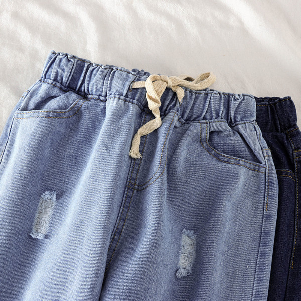 Τζιν γυναικεία με κορδόνια και σχισμένα μοτίβα