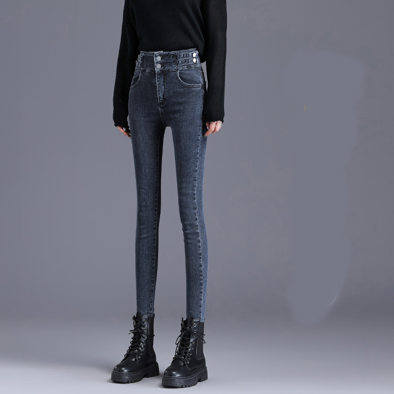 Õhukese mudeli kõrge vöökohaga naiste teksad