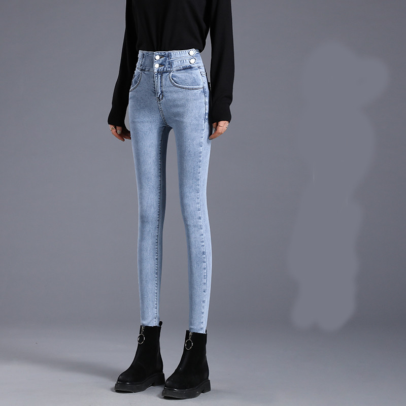 Õhukese mudeli kõrge vöökohaga naiste teksad