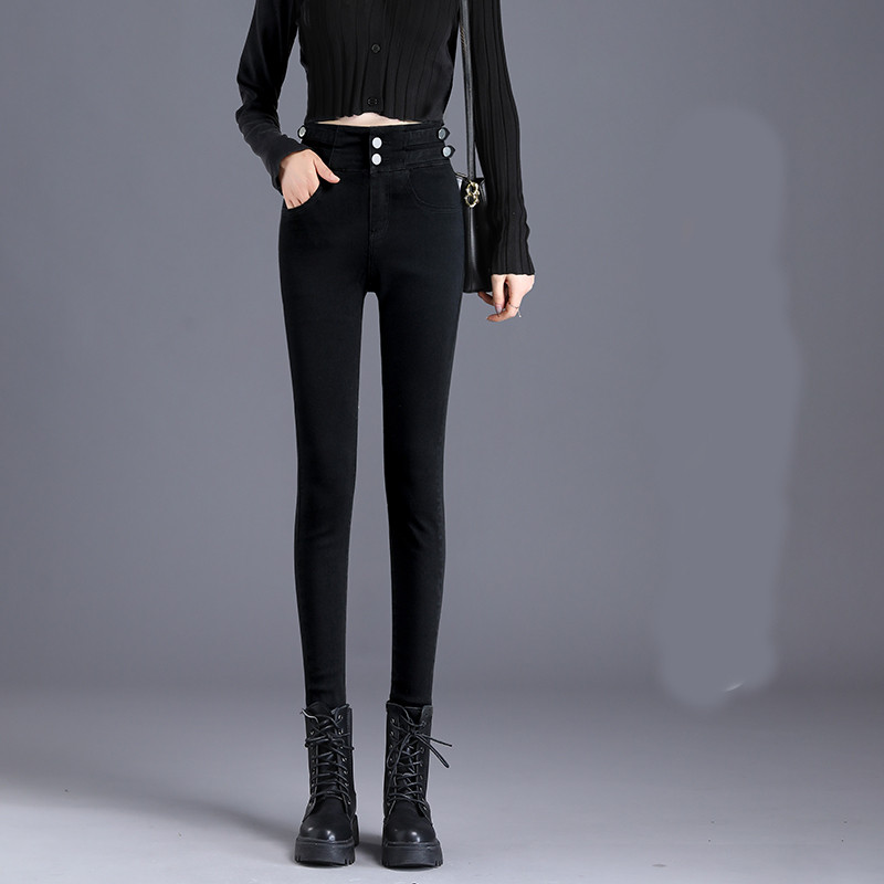 Õhukese mudeli kõrge vöökohaga naiste teksad