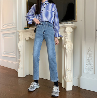 Moodsad nööbi ja kõrge vöökohaga naiste teksad