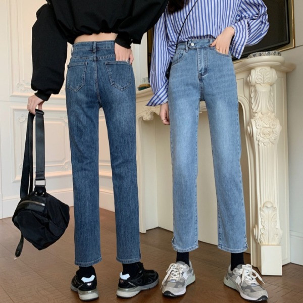 Moodsad nööbi ja kõrge vöökohaga naiste teksad