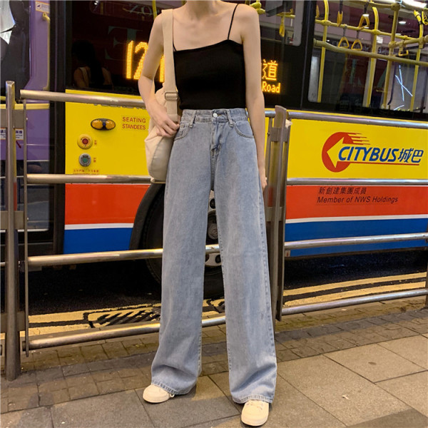 Kõrge vöökoha ja siniste taskutega vabaaja naiste teksad