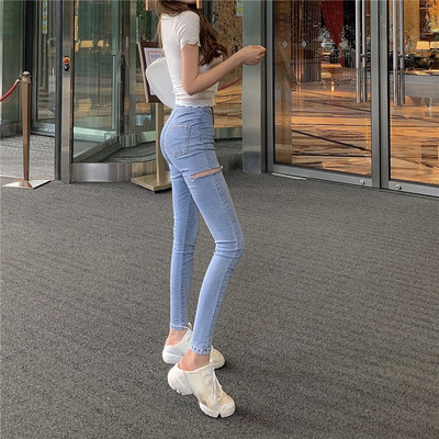 Μοντέρνα γυναικεία ελαστικά τζιν με ψηλή μέση και σκισμένα μοτίβα