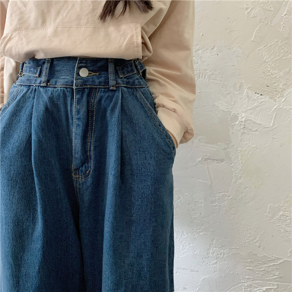 Lai sinine taskutega naiste teksapükste mudel