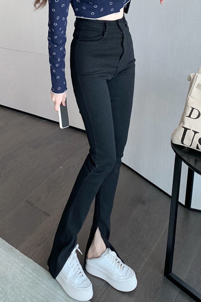 Naiste vabaaja teksad taskute ja kõrge vöökohaga musta värvi