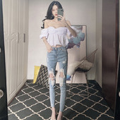 Naiste rebenenud parema ja kõrge vöökohaga teksad