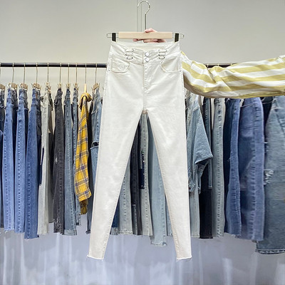 Taskute ja kõrge vöökohaga naiste teksad valged