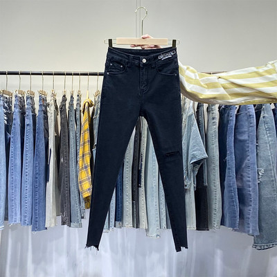 Naiste vabaaja teksad, millel on parem rebenenud ja kõrge vöökoht