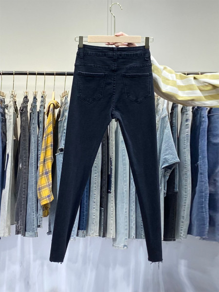 Naiste vabaaja teksad, millel on parem rebenenud ja kõrge vöökoht