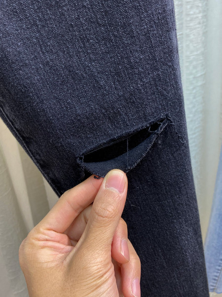 Naiste vabaaja teksad, millel on parem rebenenud ja kõrge vöökoht