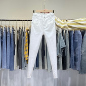 Naiste kõrge vöökohaga teksad – valget värvi