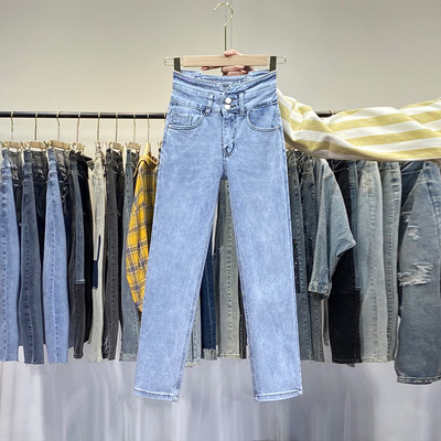 Stiilsed sinist värvi taskute ja nööpidega naiste teksad