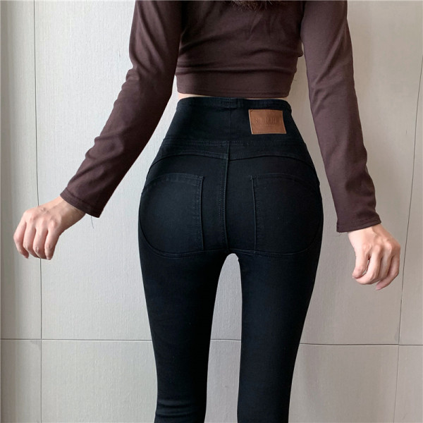 Õhukese mudeli kolme nööbiga naiste teksad