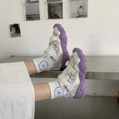 Moodsad värvilise tallaga tossud naistele