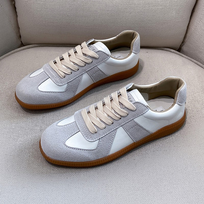 Naiste vabaaja tossud ökoseemisnahast hallide lipsudega