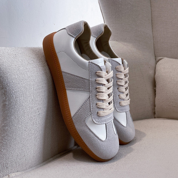 Naiste vabaaja tossud ökoseemisnahast hallide lipsudega