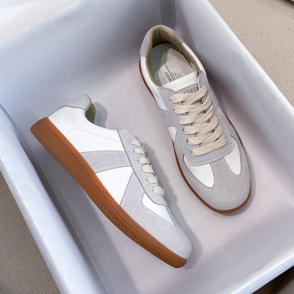 Naiste vabaaja tossud ökoseemisnahast hallide lipsudega