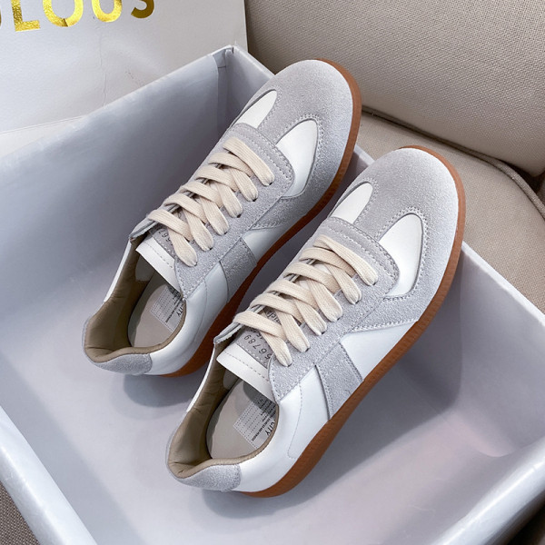 Naiste vabaaja tossud ökoseemisnahast hallide lipsudega