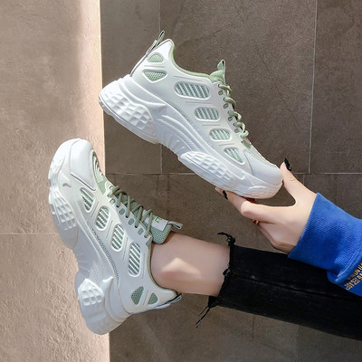 Γυναικεία αθλητικά παπούτσια σε λευκό και πράσινο χρώμα