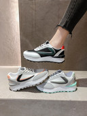 Naiste moodsad musta ja halli tossud lameda tallaga