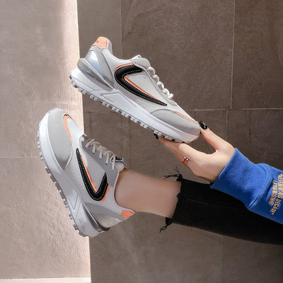 Naiste moodsad musta ja halli tossud lameda tallaga