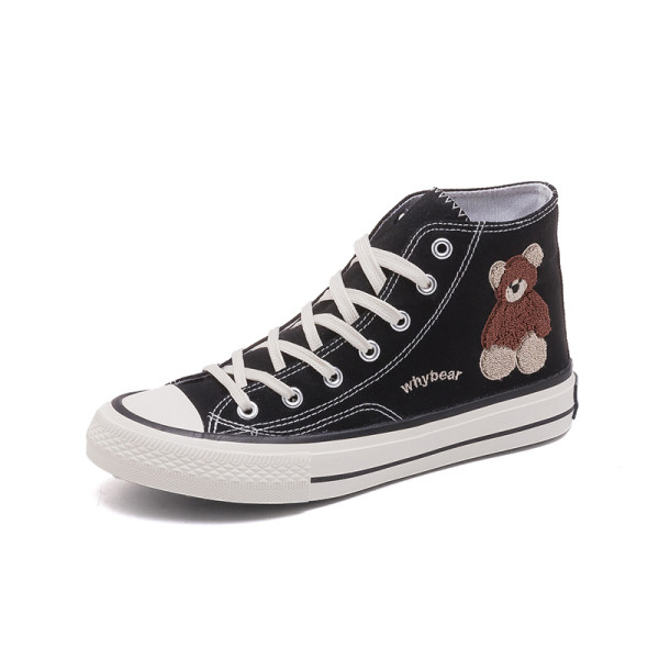 Naiste tikandiga lõuendist tossud