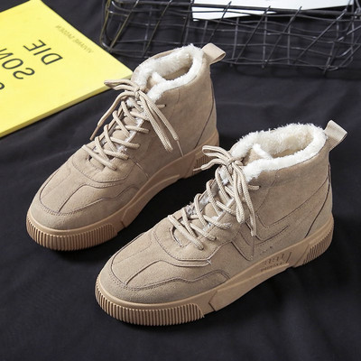 Pehme voodri ja lameda tallaga uus musta värvi talviste naiste tossude mudel