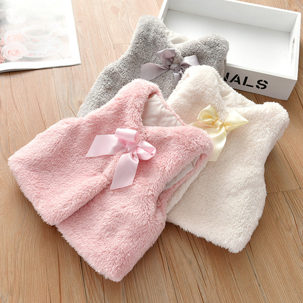 Pūkinė vaikiška liemenė su kaspinu tinka mergaitėms