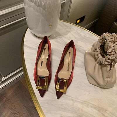 Moderne ženske cipele s trakom i visokom petom