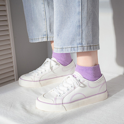 Platnene ženske tenisice s vezicama i ravnim potplatom