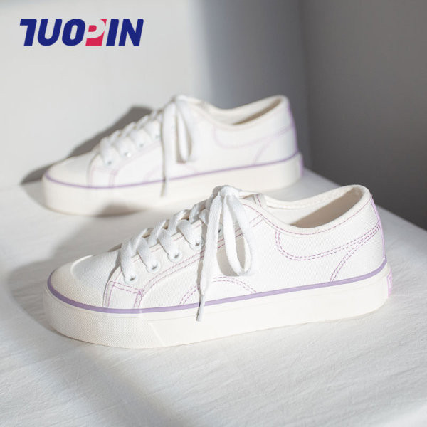 Platnene ženske tenisice s vezicama i ravnim potplatom