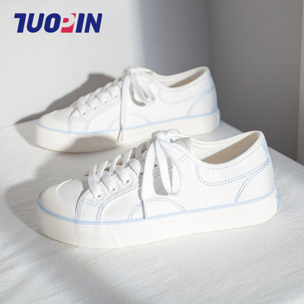 Platnene ženske tenisice s vezicama i ravnim potplatom