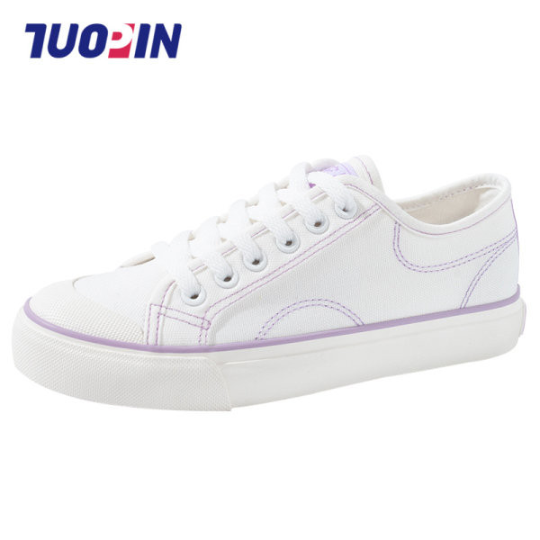 Platnene ženske tenisice s vezicama i ravnim potplatom