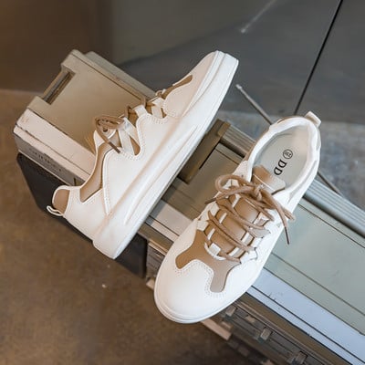 Ženske ležerne tenisice u dvije boje sa vezicama i ravnim đonom