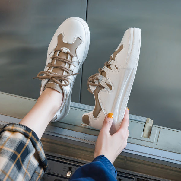 Ženske ležerne tenisice u dvije boje sa vezicama i ravnim đonom