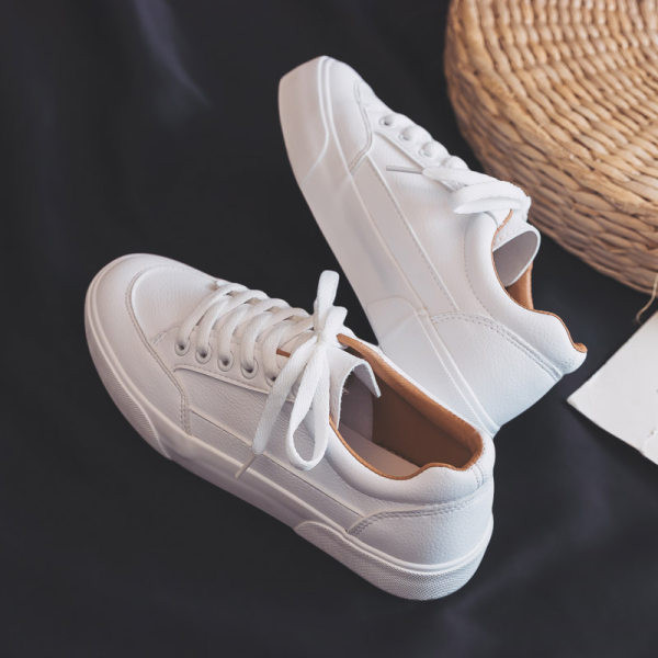 Ženske kožne tenisice jednobojni model sa vezicama