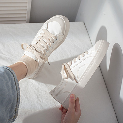 Platnene ženske tenisice s ravnim potplatom