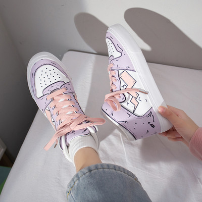 Šarene ženske tenisice s aplikacijama i vezicama