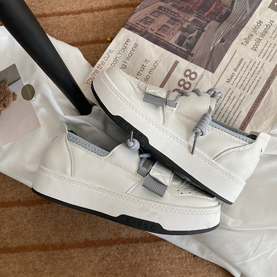 Ženske tenisice bijele boje sa vezicama u dvije boje