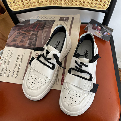 Ženske tenisice bijele boje sa vezicama u dvije boje