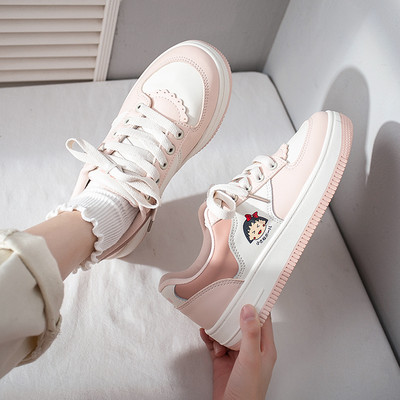 Ženske kožne tenisice s aplikacijom i ravnim potplatom