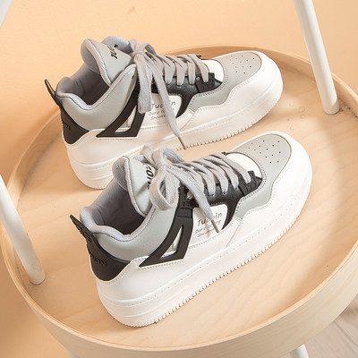 Ženske tenisice s natpisima i vezicama