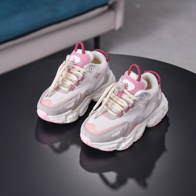 Dječje tenisice s grubim potplatom i vezicama u crnoj i bijeloj boji