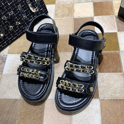 Ženske sandale u bijeloj i crnoj boji sa ravnim đonom