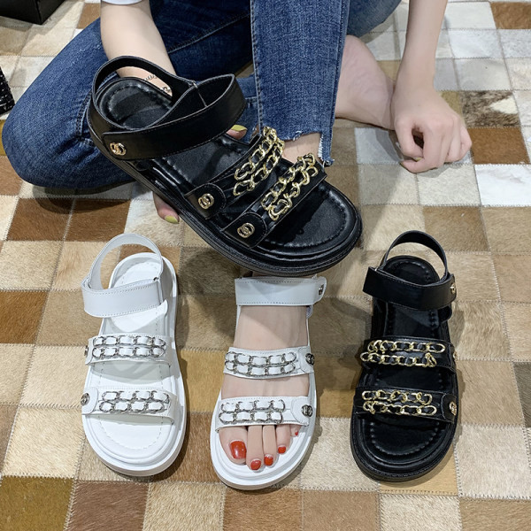 Ženske sandale u bijeloj i crnoj boji sa ravnim đonom