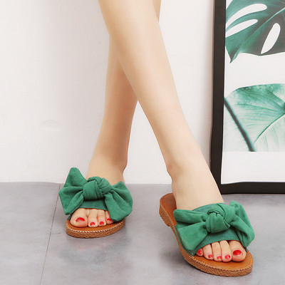 Moderne ženske papuče s trakom od eko brušene kože i ravnim potplatom