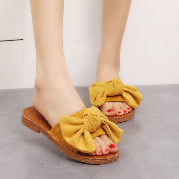 Moderne ženske papuče s trakom od eko brušene kože i ravnim potplatom